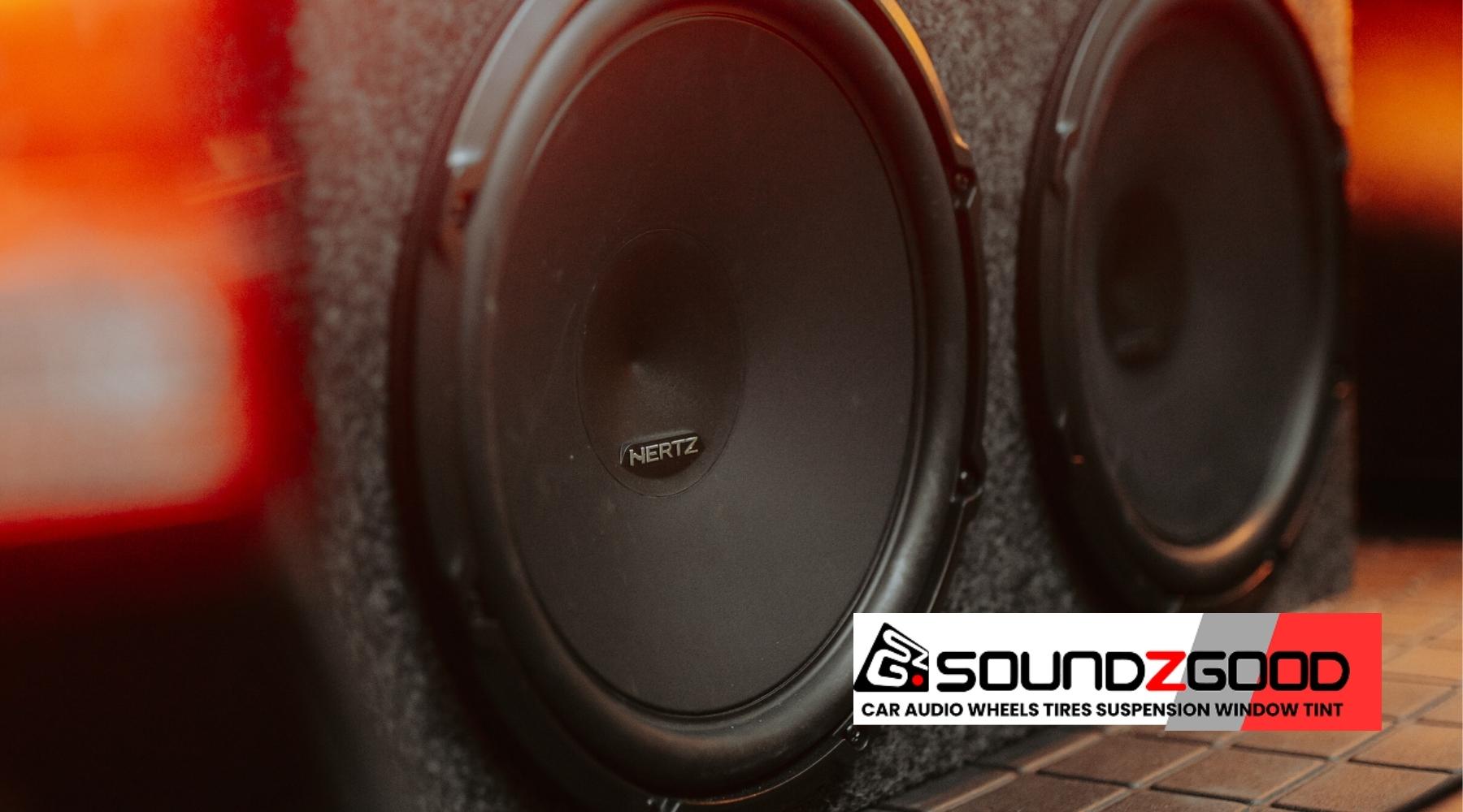 High‑performance Hertz subwoofers installed in a custom car audio enclosure at Soundz Good Garage in Oxnard, CA.