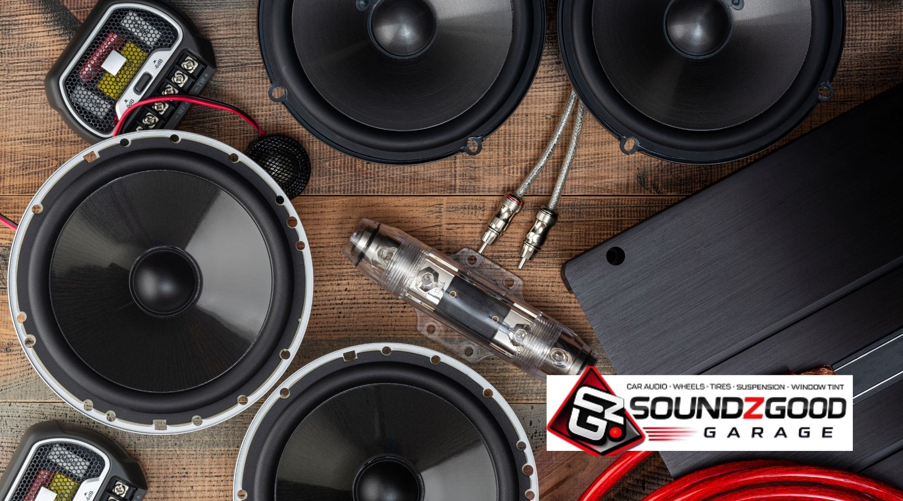 Car subwoofers, amplifier, wiring kit, and car audio components prepared for professional Car subwoofer installation Norwalk service