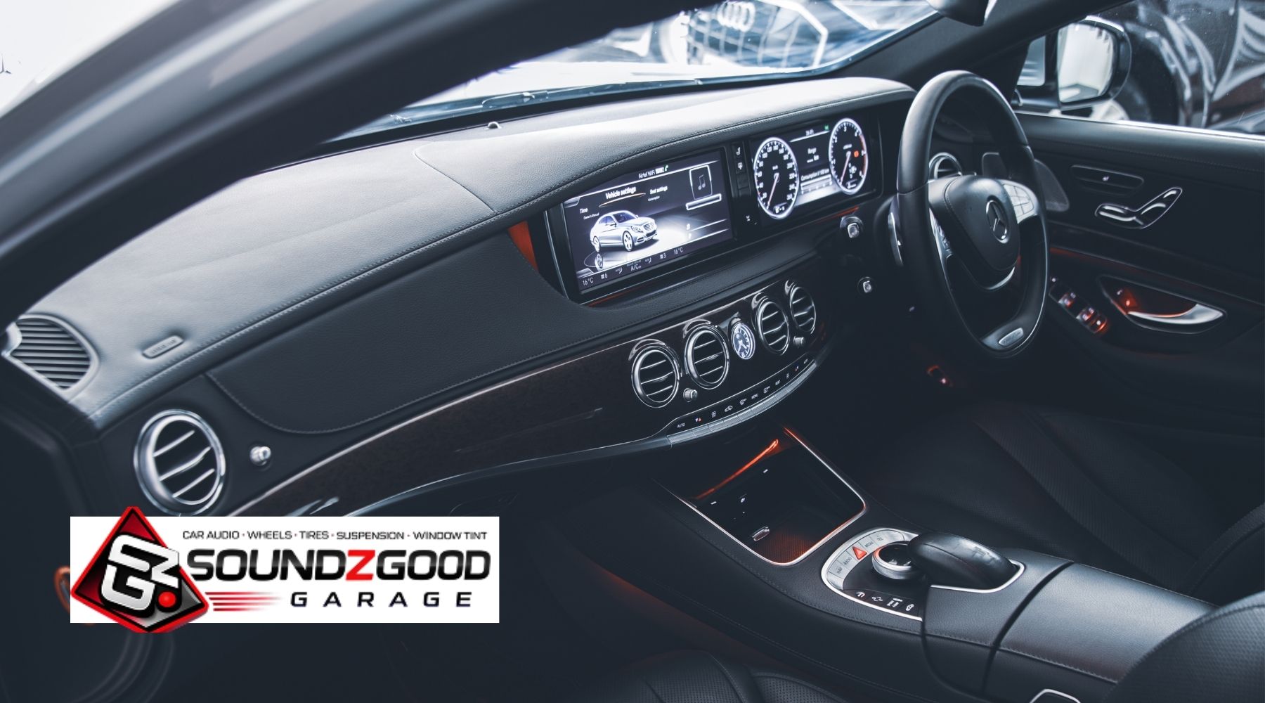 Luxury car interior with touchscreen infotainment display showcasing modern in-car entertainment system upgrade in Norwalk.