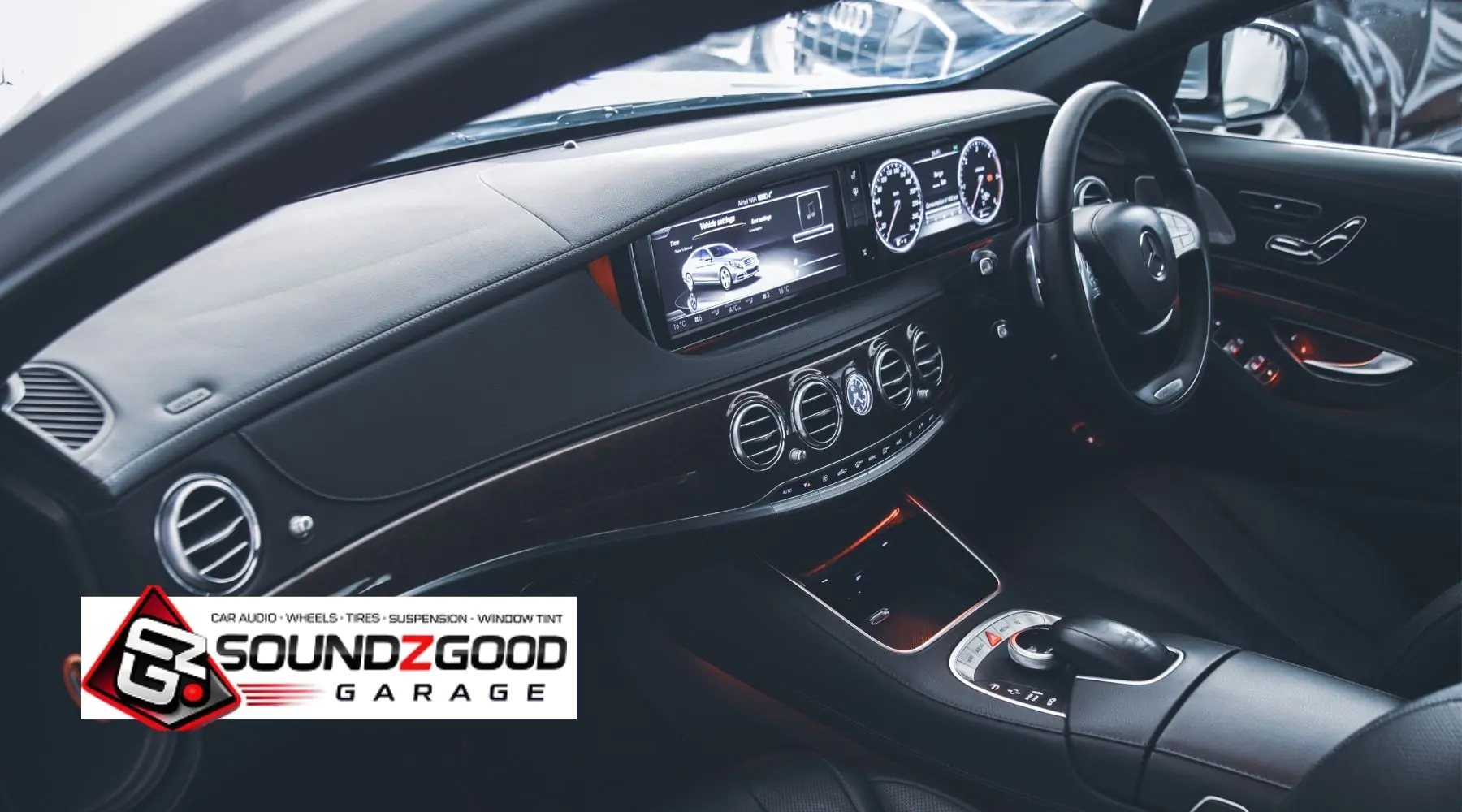 Luxury car interior with touchscreen infotainment display showcasing modern in-car entertainment system upgrade in Norwalk.